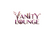 A stylized logo reading 'VANITY LOUNGE' in purple and pink lettering with decorative hair tools integrated into the design, centered on a solid black background.